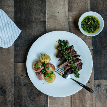 Seared steak with potatoes and chimichurri sauce